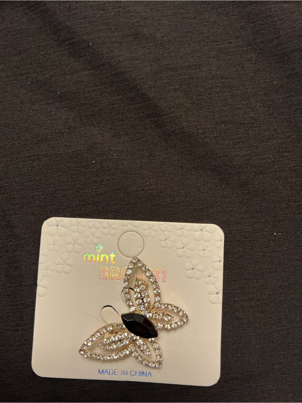 Brooch - likely Hair Accessory or Pins